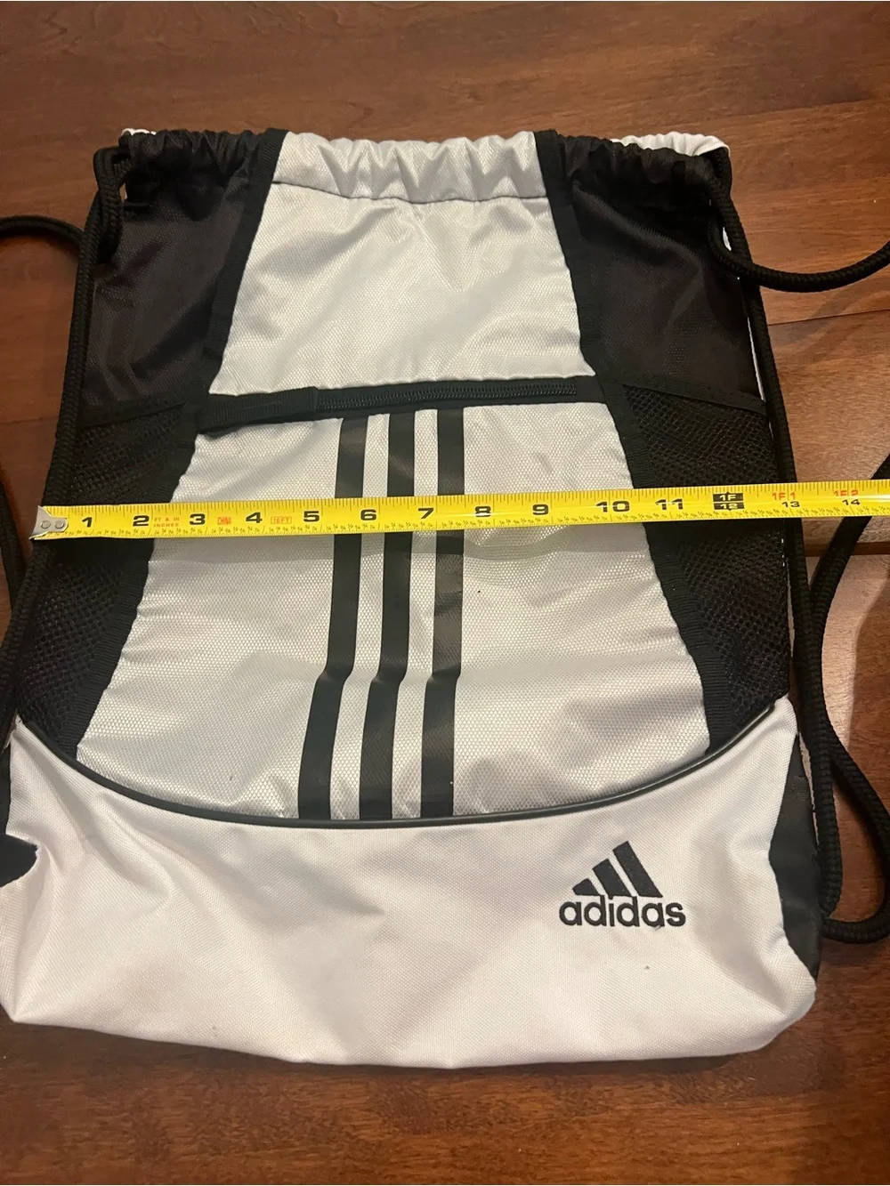 adidas White and Black Drawstring Backpack with Front Zip Pocket